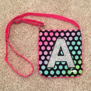 NEW! Justice crossbody purse with initial “A”